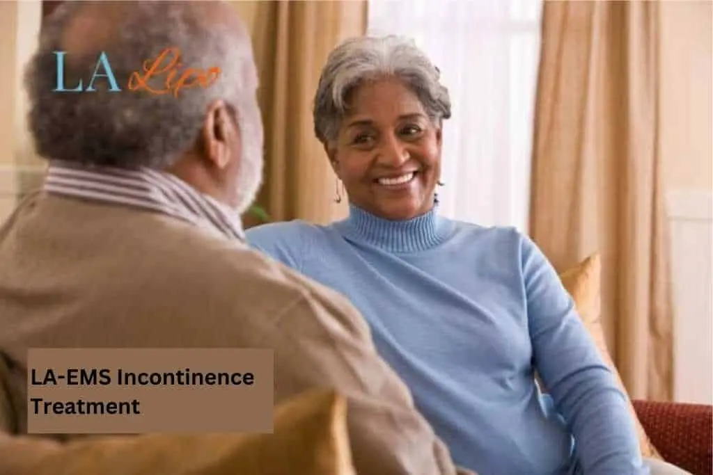 Couple sat smiling at each other - LA-EMS treatment Chigwell